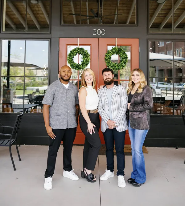 The team outside Provisions Barber